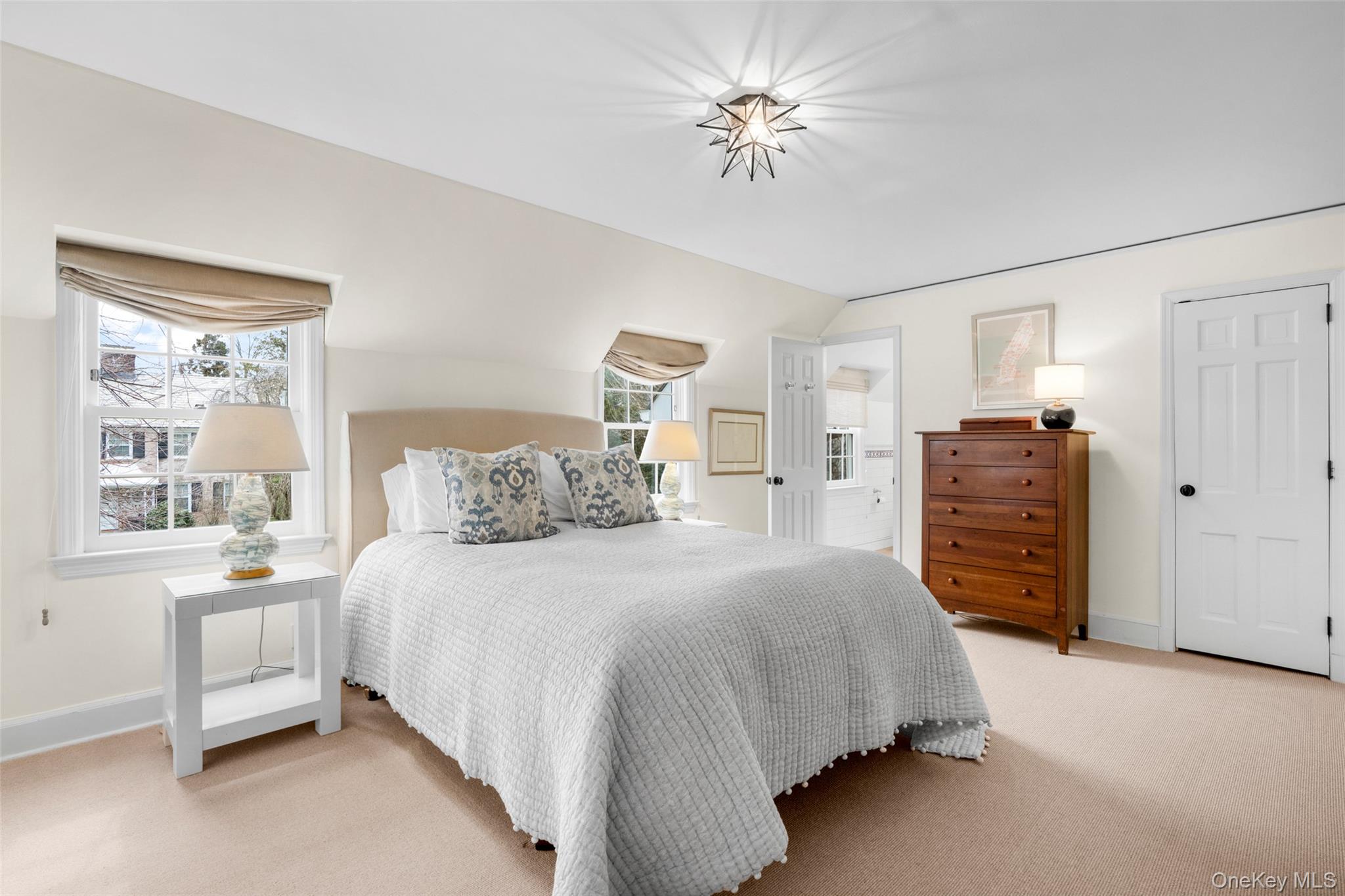 111 Berrian Road New Rochelle, NY 10804 - Photo 16 of 33 a bedroom with a bed dresser and a window