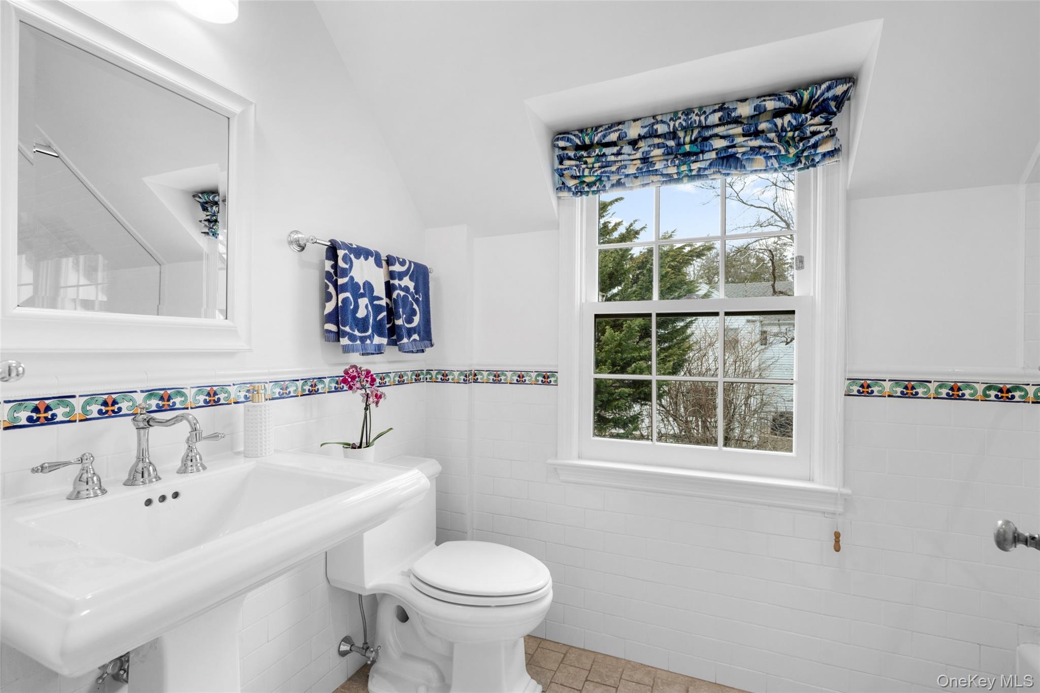 111 Berrian Road New Rochelle, NY 10804 - Photo 21 of 33 a bathroom with a sink and a bathtub