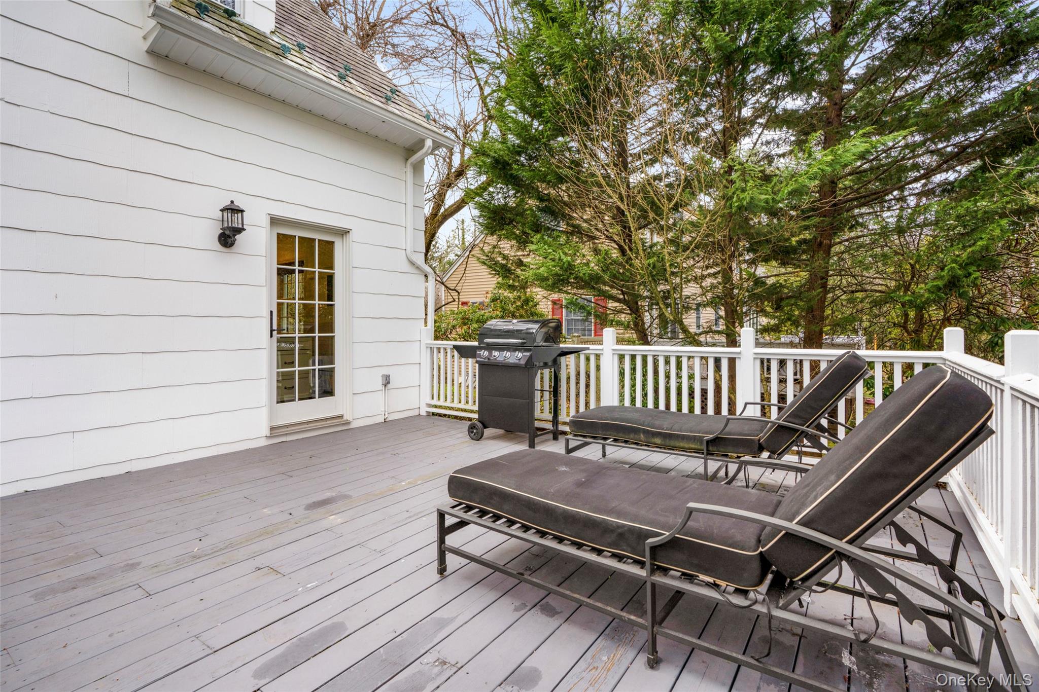 111 Berrian Road New Rochelle, NY 10804 - Photo 26 of 33 a view of a roof deck with wooden floor and fence