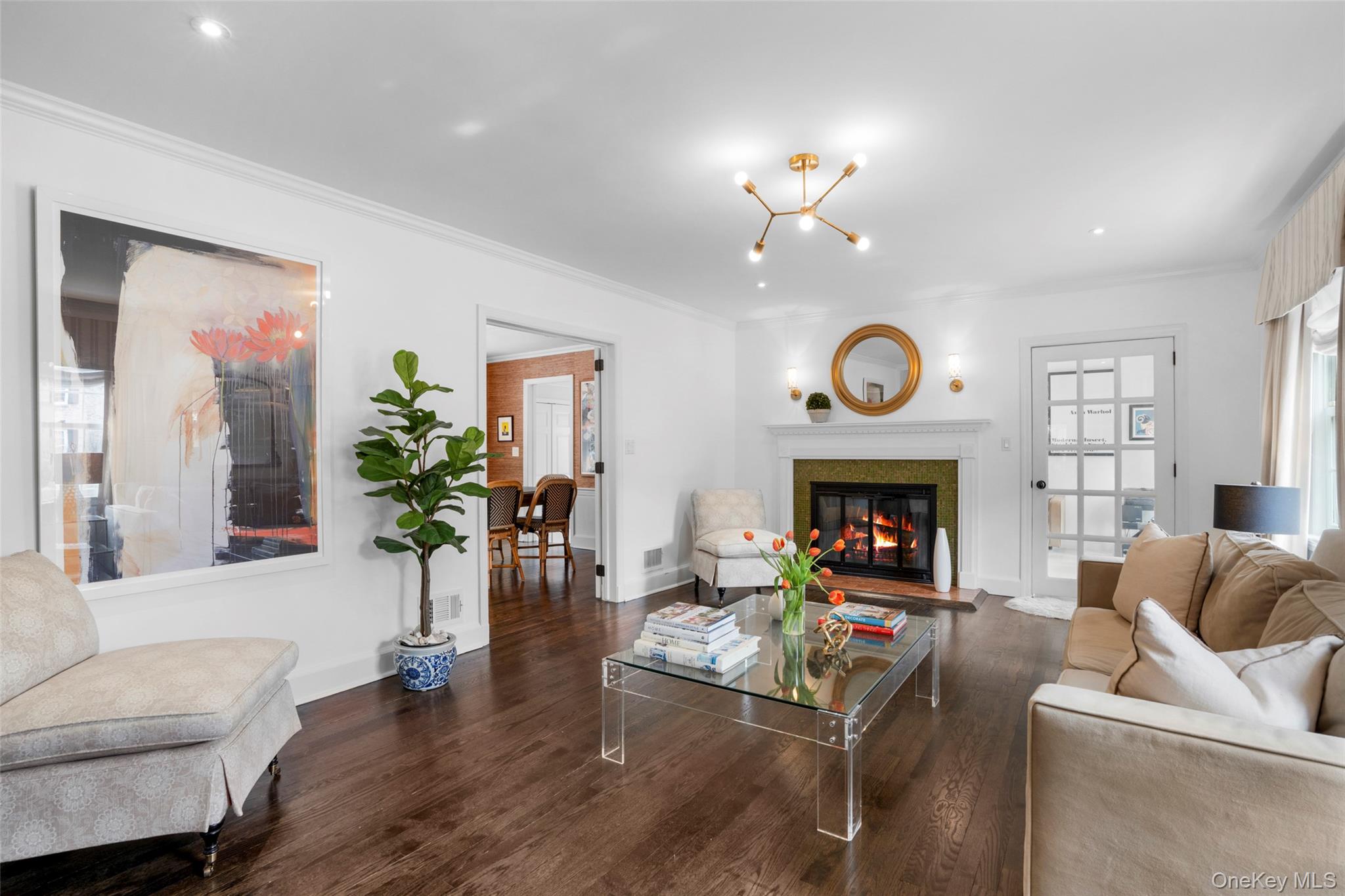 111 Berrian Road New Rochelle, NY 10804 - Photo 4 of 33 a living room with furniture and a fireplace