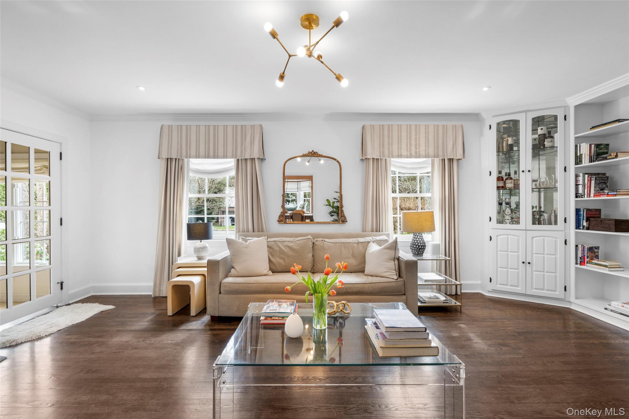 111 Berrian Road New Rochelle, NY 10804 - Photo 5 of 33 a living room with furniture and large windows