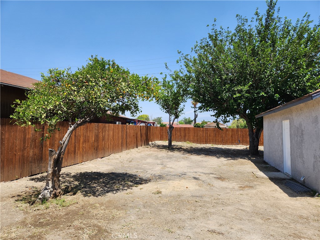 841 East H Street Colton, CA 92324 - Photo 17 of 23 a view of a backyard
