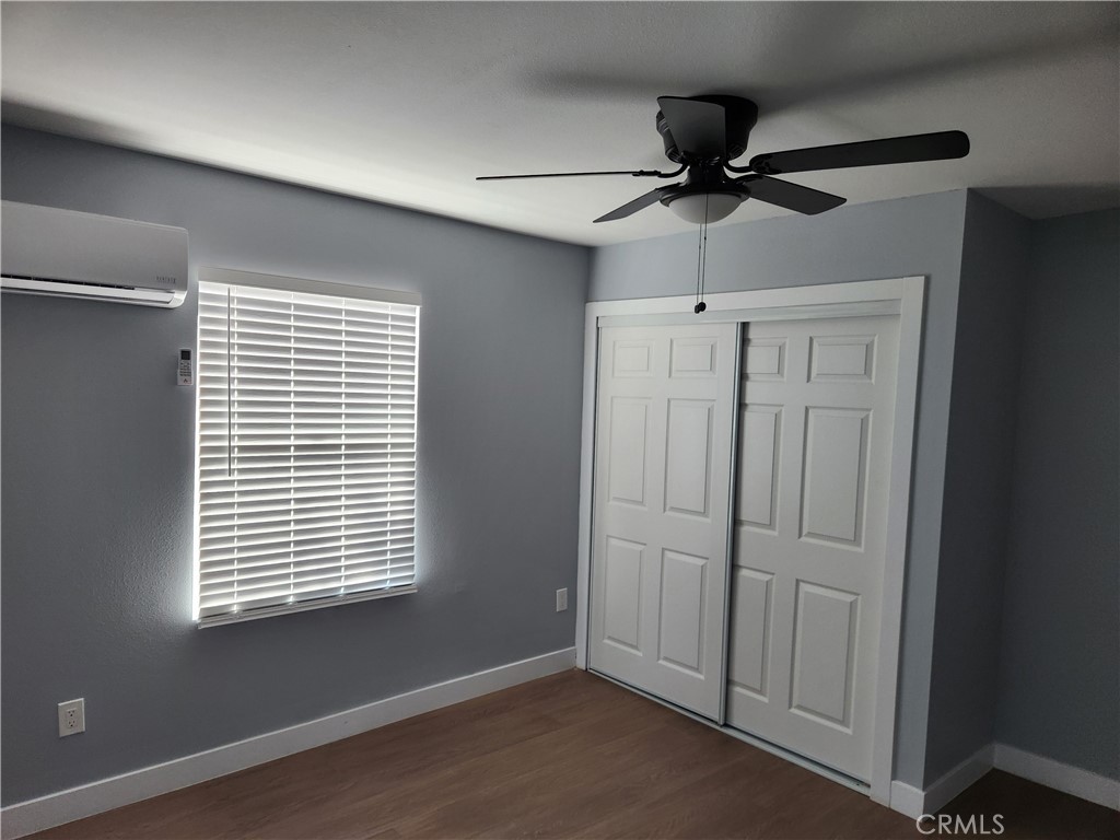 841 East H Street Colton, CA 92324 - Photo 8 of 23 a view of an empty room with a window