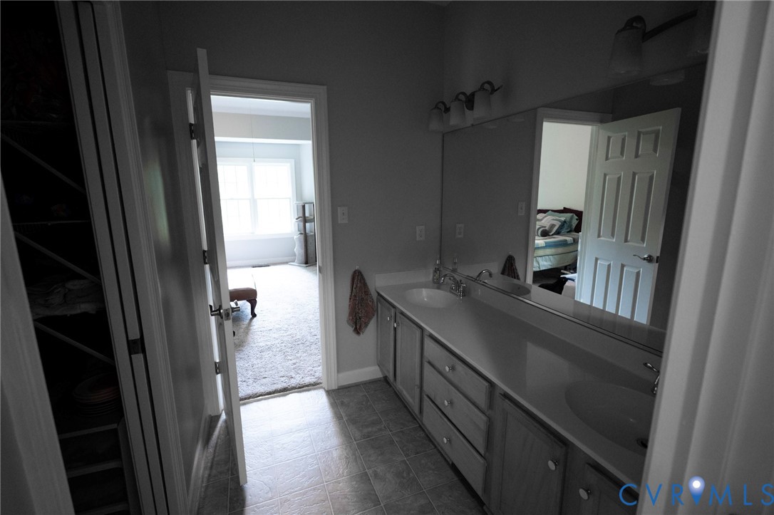 1670 Mill Quarter Road Powhatan, VA 23139 - Photo 13 of 24 First floor primary bath, double vanity, walk in