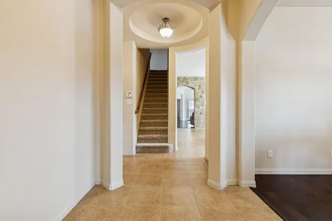 a view of a hallway with entryway