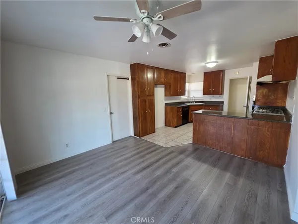 a view of a kitchen from the hallway