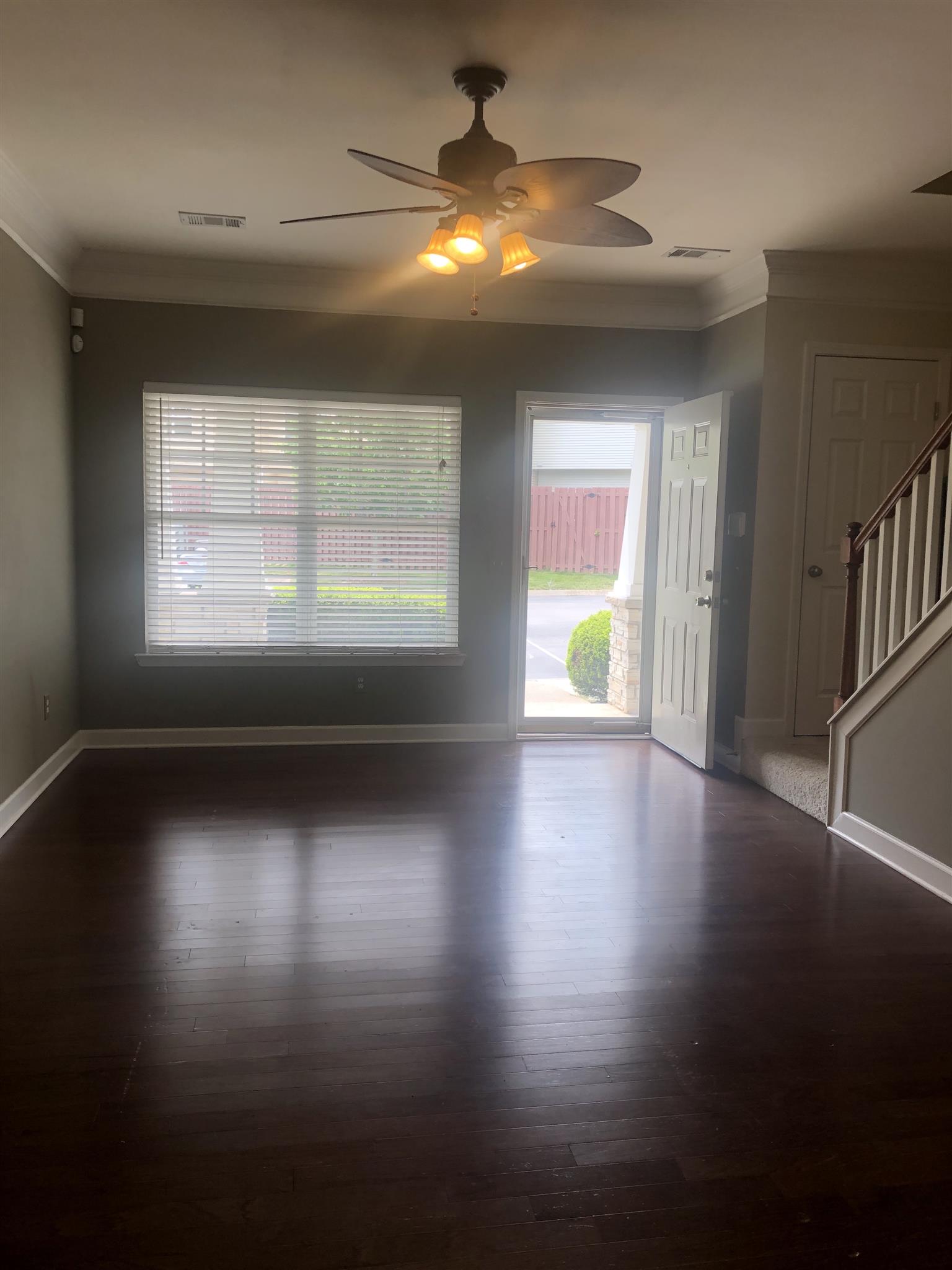 3535 Bell Road, Unit 804 Nashville, TN 37214 - Photo 2 of 15 living room; large coat closet on landing