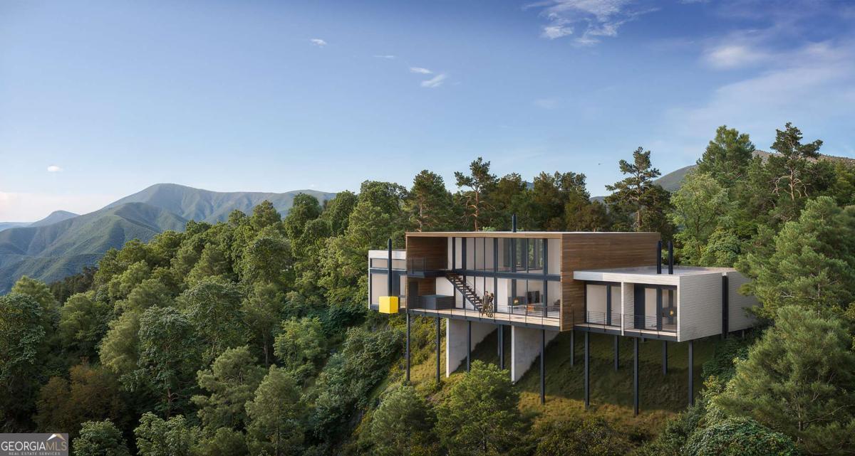 an aerial view of house with balcony