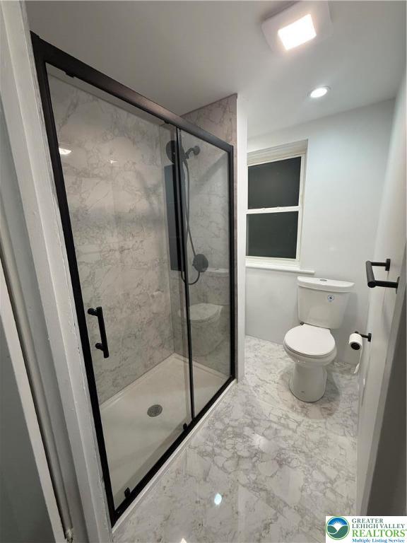 2014 Green Street Allentown, PA 18104 - Photo 9 of 14 a bathroom with a shower and a toilet