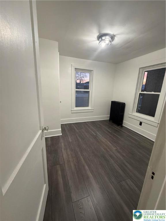 2014 Green Street Allentown, PA 18104 - Photo 10 of 14 an empty room with wooden floor and windows