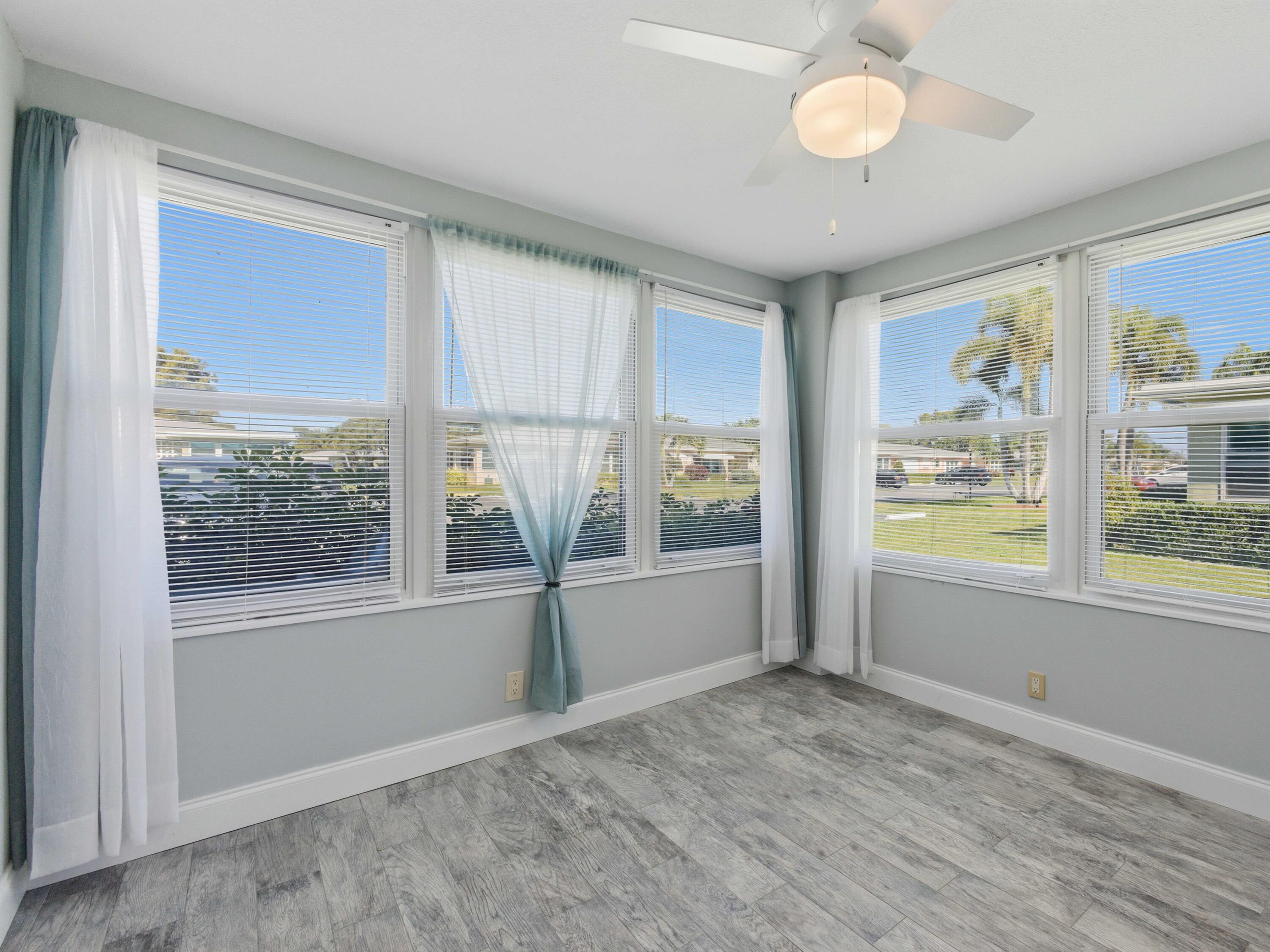 270 High Point Boulevard, Unit A Boynton Beach, FL 33435 - Photo 13 of 44 a view of an empty room with a window