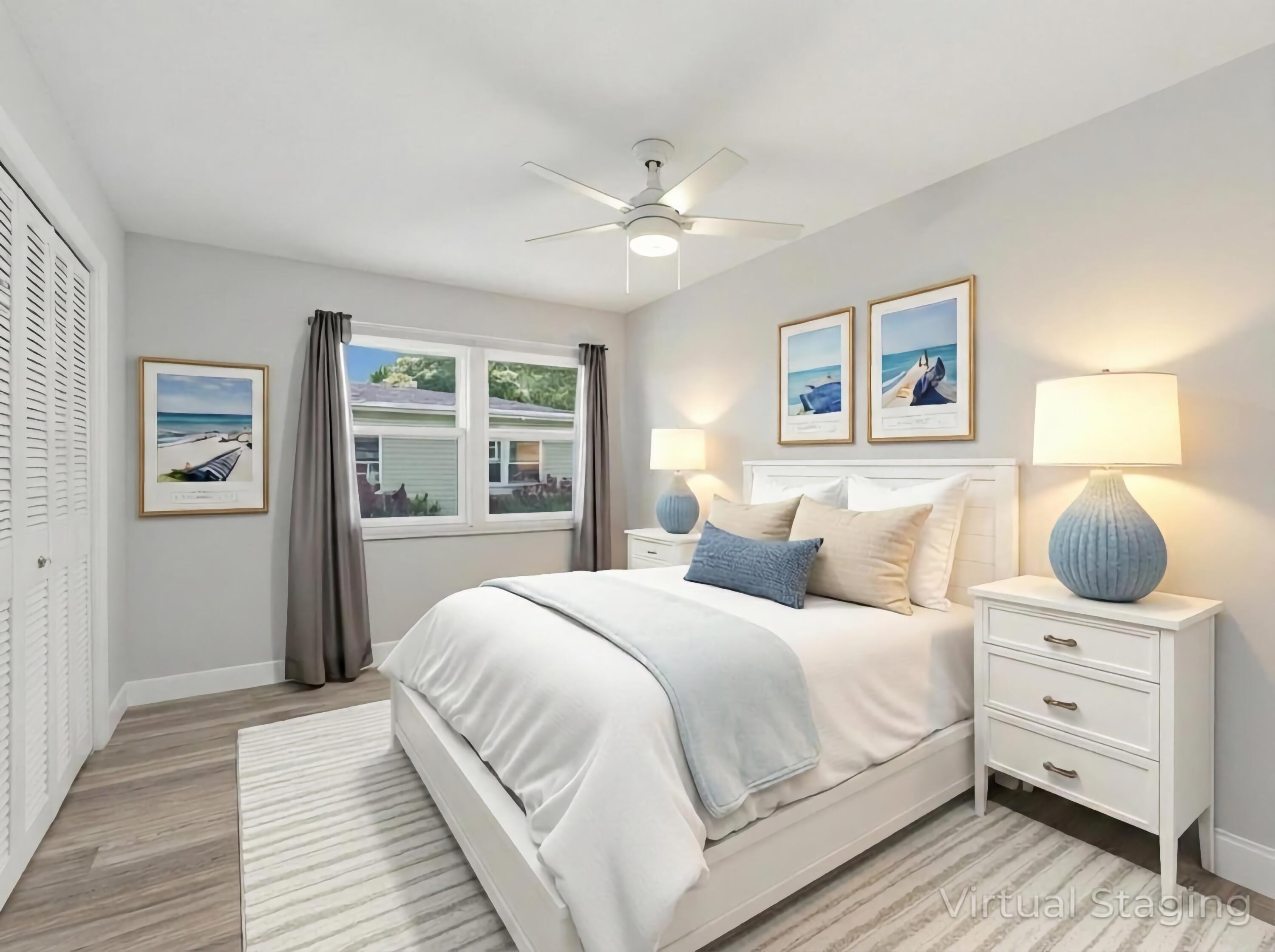 270 High Point Boulevard, Unit A Boynton Beach, FL 33435 - Photo 25 of 44 a bedroom with a large bed and a window