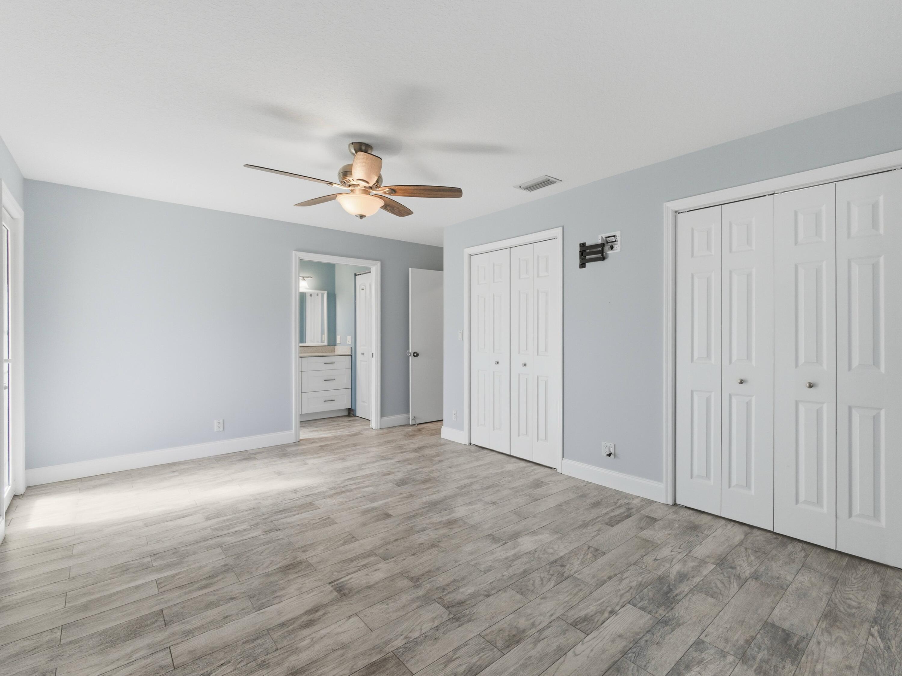 270 High Point Boulevard, Unit A Boynton Beach, FL 33435 - Photo 31 of 44 a view of an empty room with a window