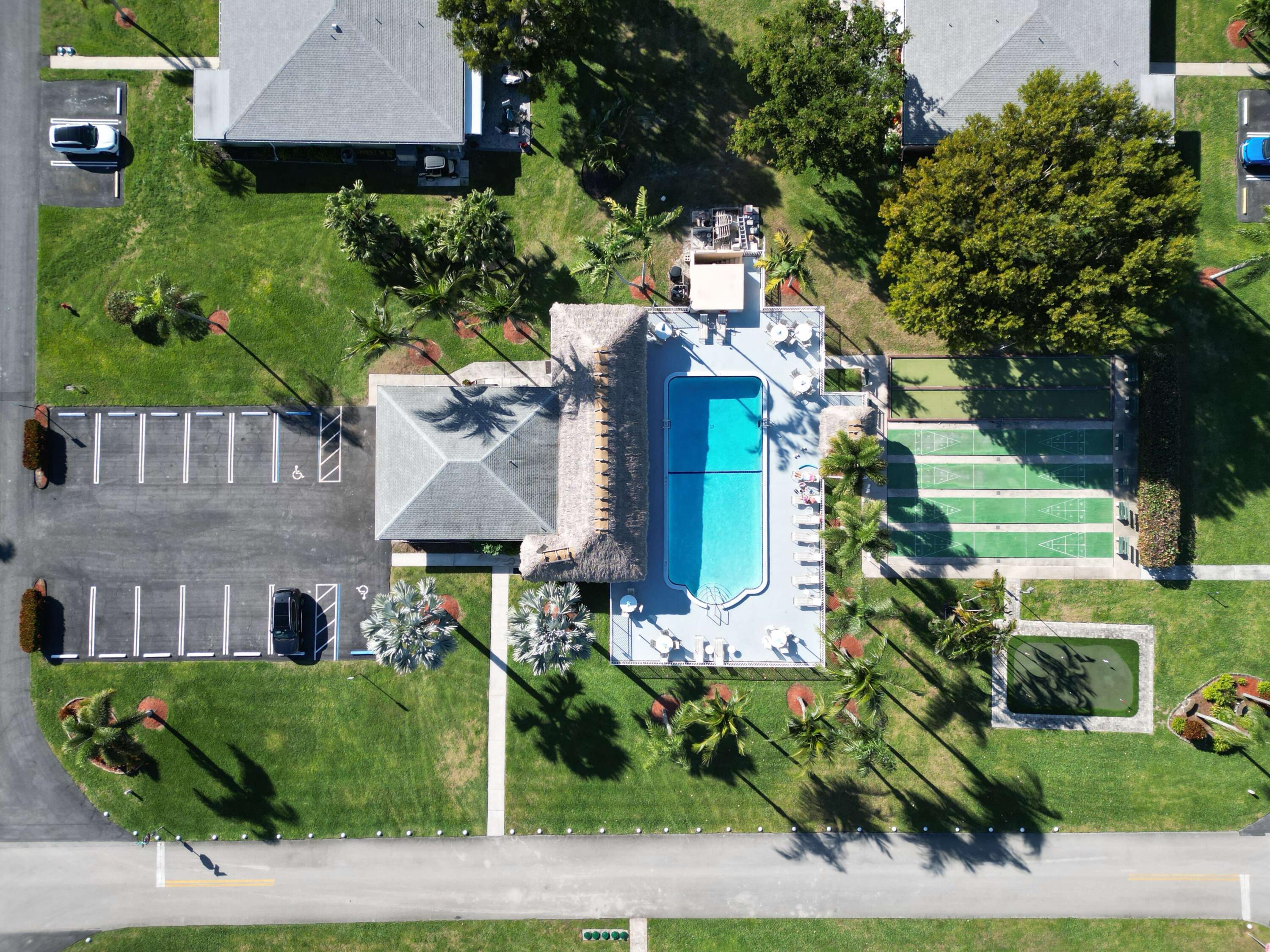270 High Point Boulevard, Unit A Boynton Beach, FL 33435 - Photo 41 of 44 an aerial view of a house with a garden and plants
