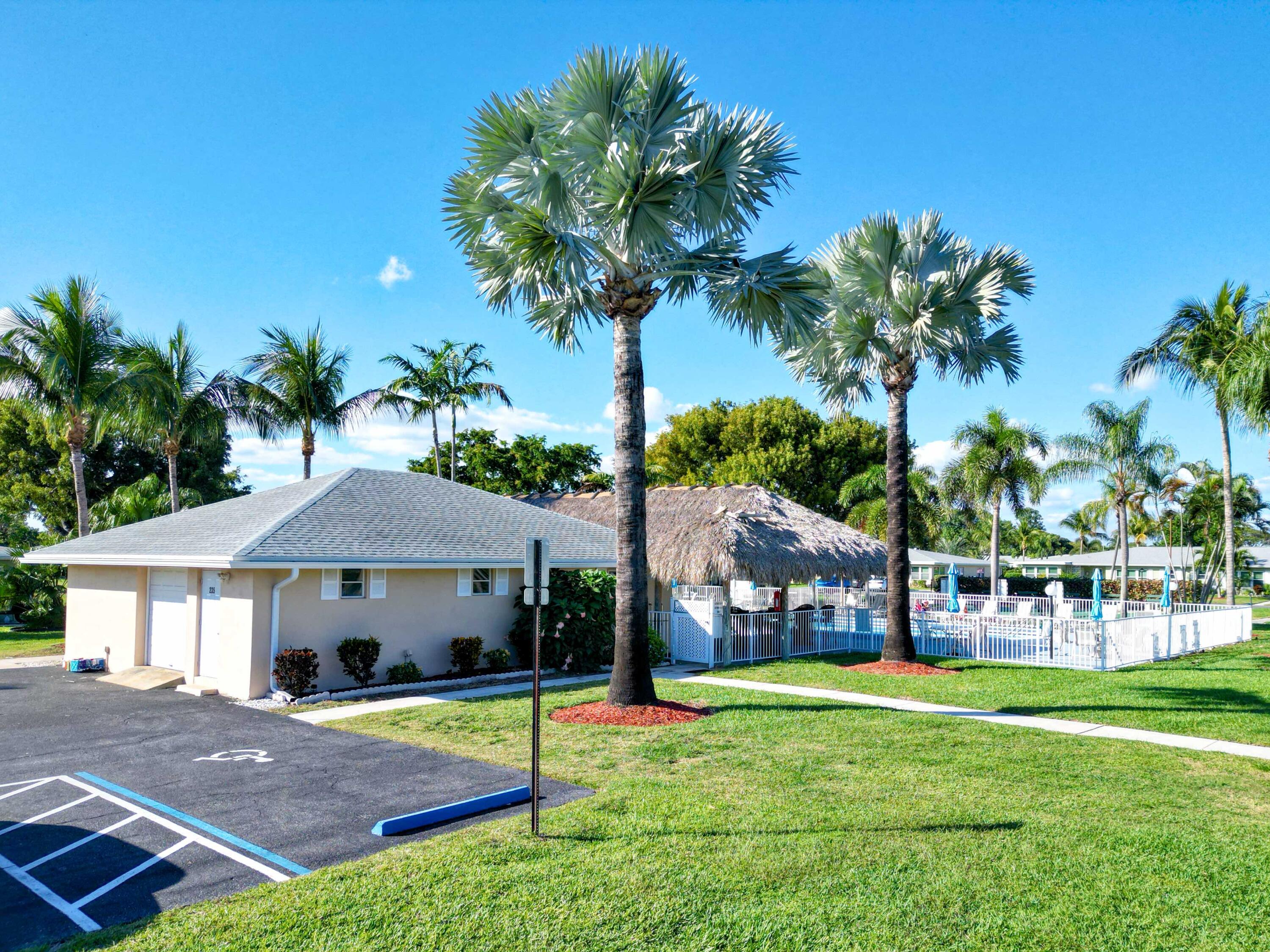 270 High Point Boulevard, Unit A Boynton Beach, FL 33435 - Photo 43 of 44 a view of house with outdoor space and swimming pool