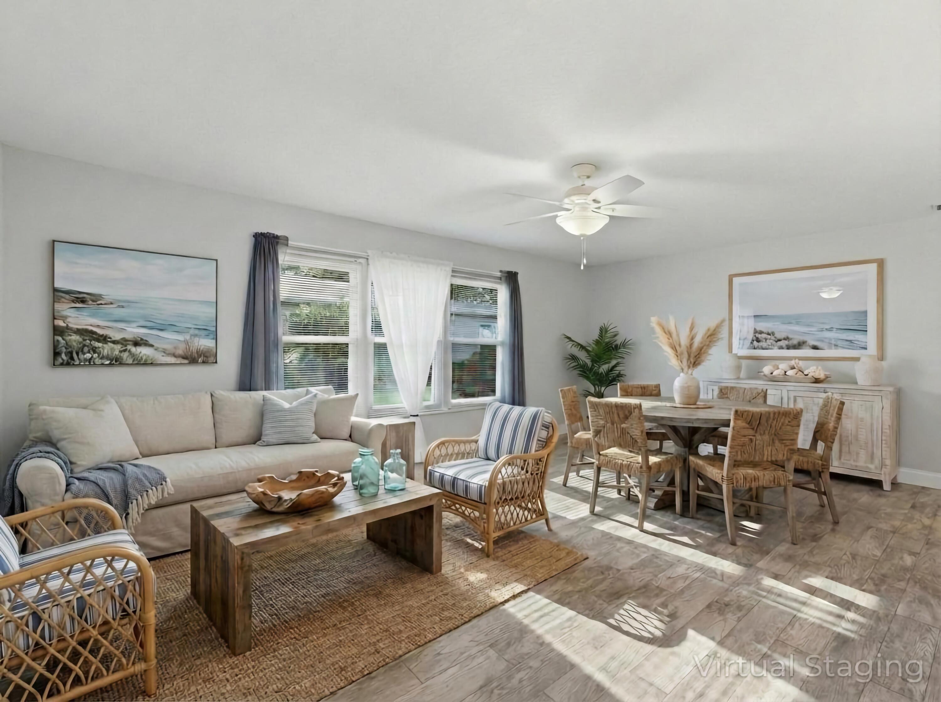 270 High Point Boulevard, Unit A Boynton Beach, FL 33435 - Photo 10 of 44 a living room with furniture a large window and a dining table