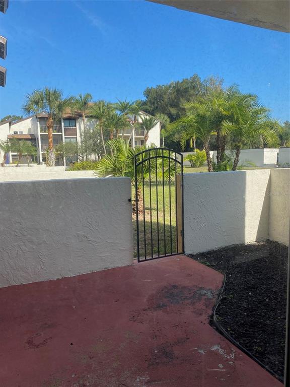 2209 Belleair Road, Unit C21 Clearwater, FL 33764 - Photo 18 of 23 a view of outdoor space and city view