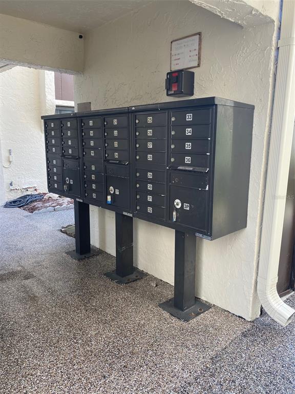 2209 Belleair Road, Unit C21 Clearwater, FL 33764 - Photo 21 of 23 a view of a wooden floor and entryway