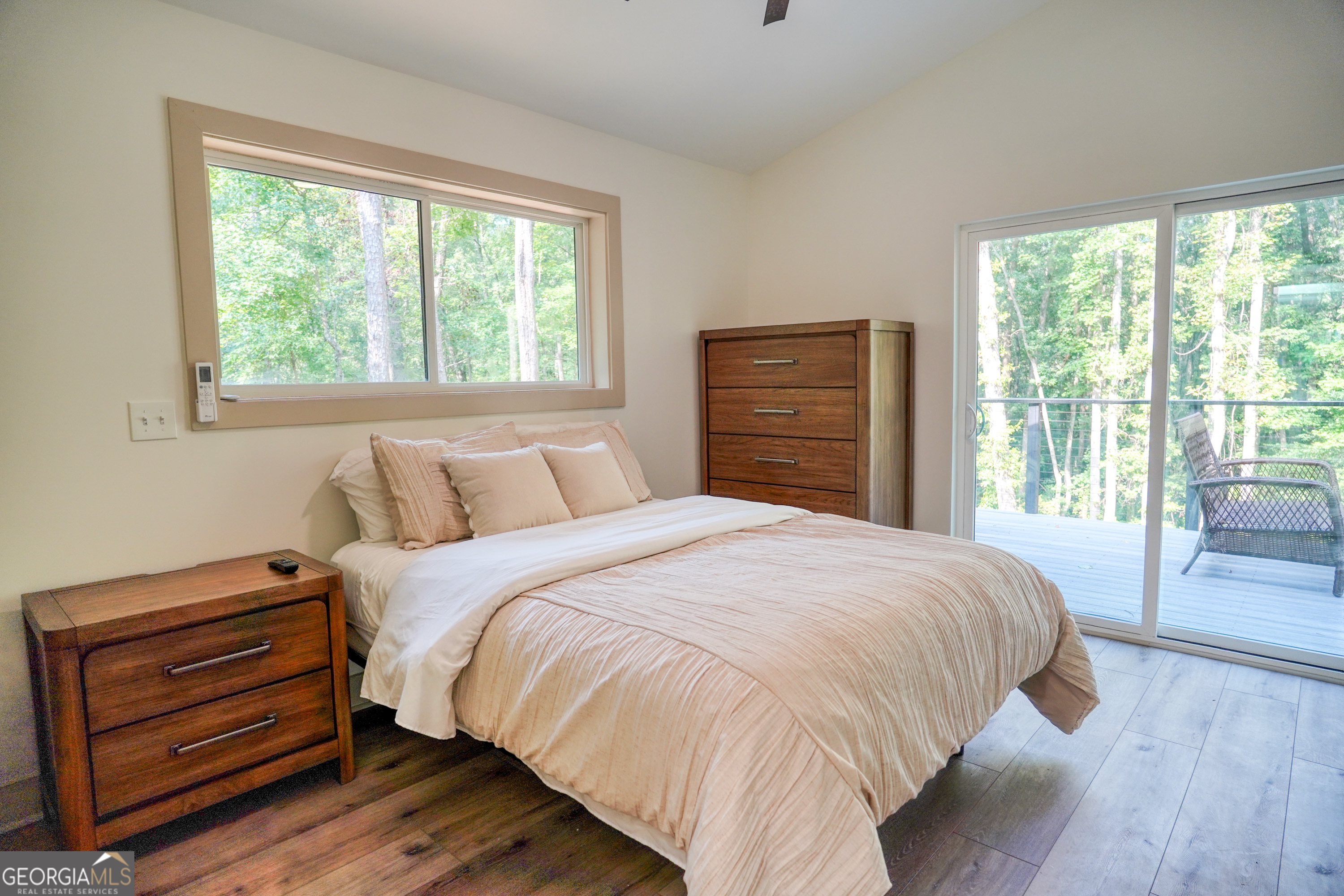 440 Palmetto Road Tyrone, GA 30290 - Photo 13 of 32 a bedroom with a bed next to a window