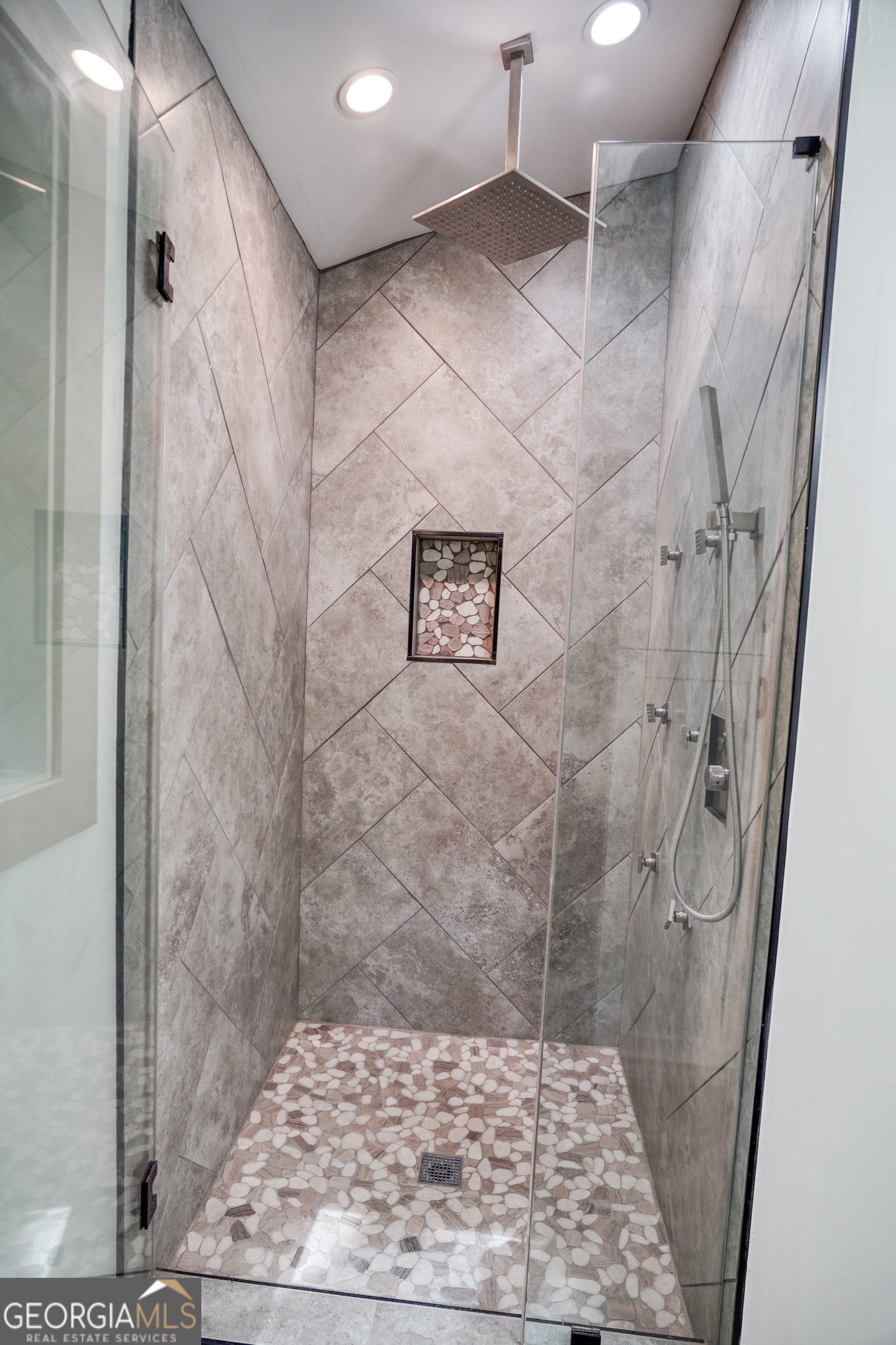 440 Palmetto Road Tyrone, GA 30290 - Photo 19 of 32 a bathroom with a shower