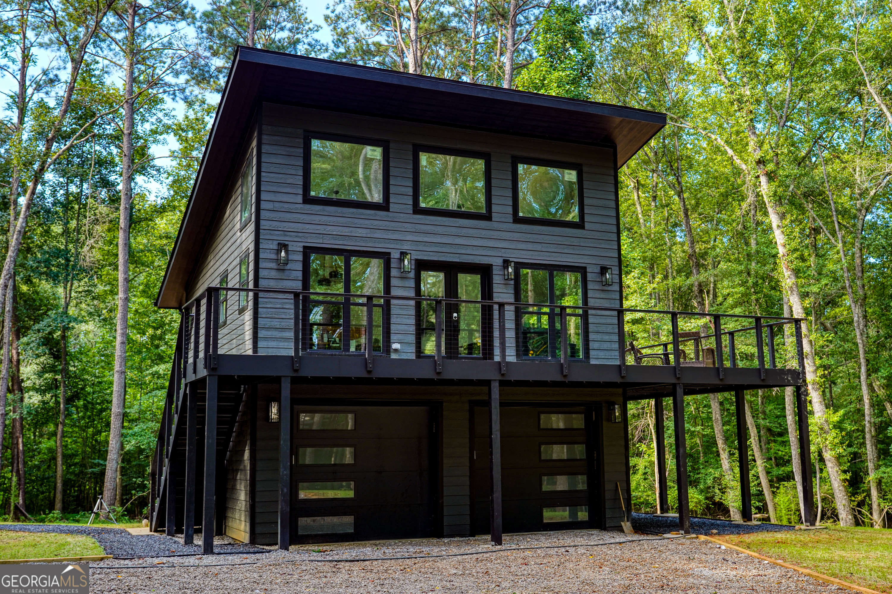 440 Palmetto Road Tyrone, GA 30290 - Photo 2 of 32 front view of a house with a large window