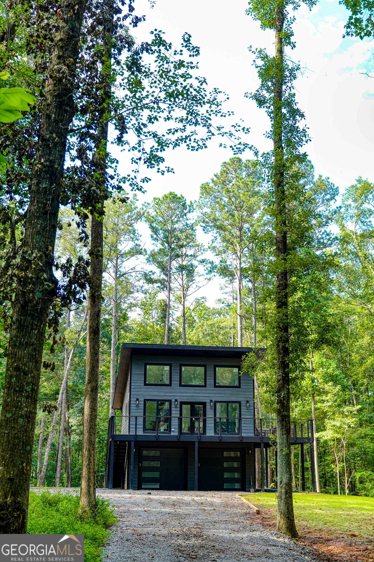 440 Palmetto Road Tyrone, GA 30290 - Photo 26 of 32 a view of a house with a tree in front of it