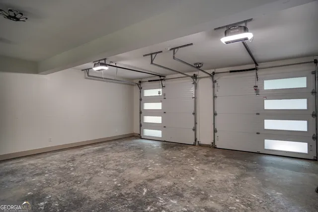 a bathroom with a toilet a sink a vanity and mirror
