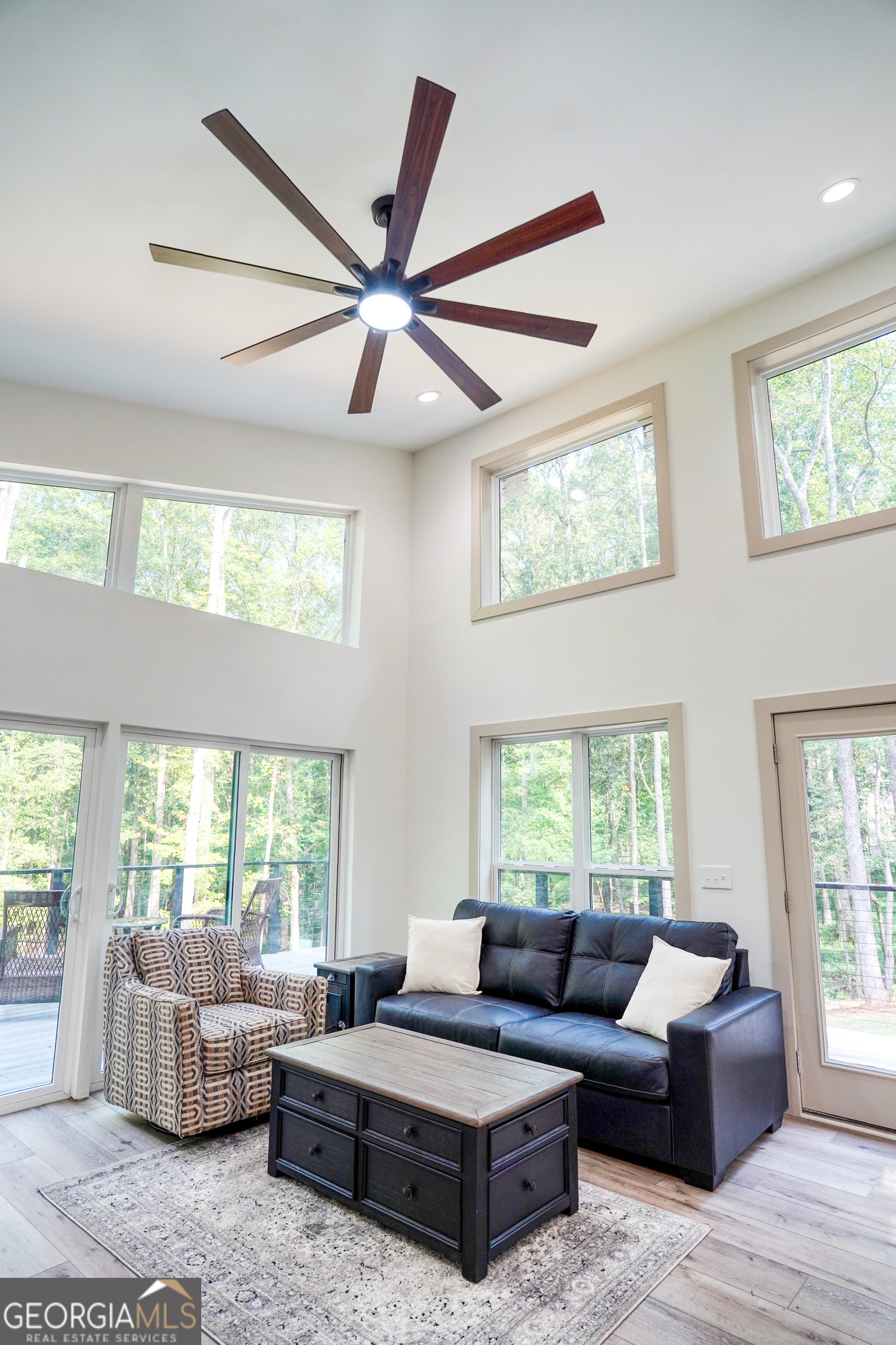 440 Palmetto Road Tyrone, GA 30290 - Photo 3 of 32 a living room with furniture and windows