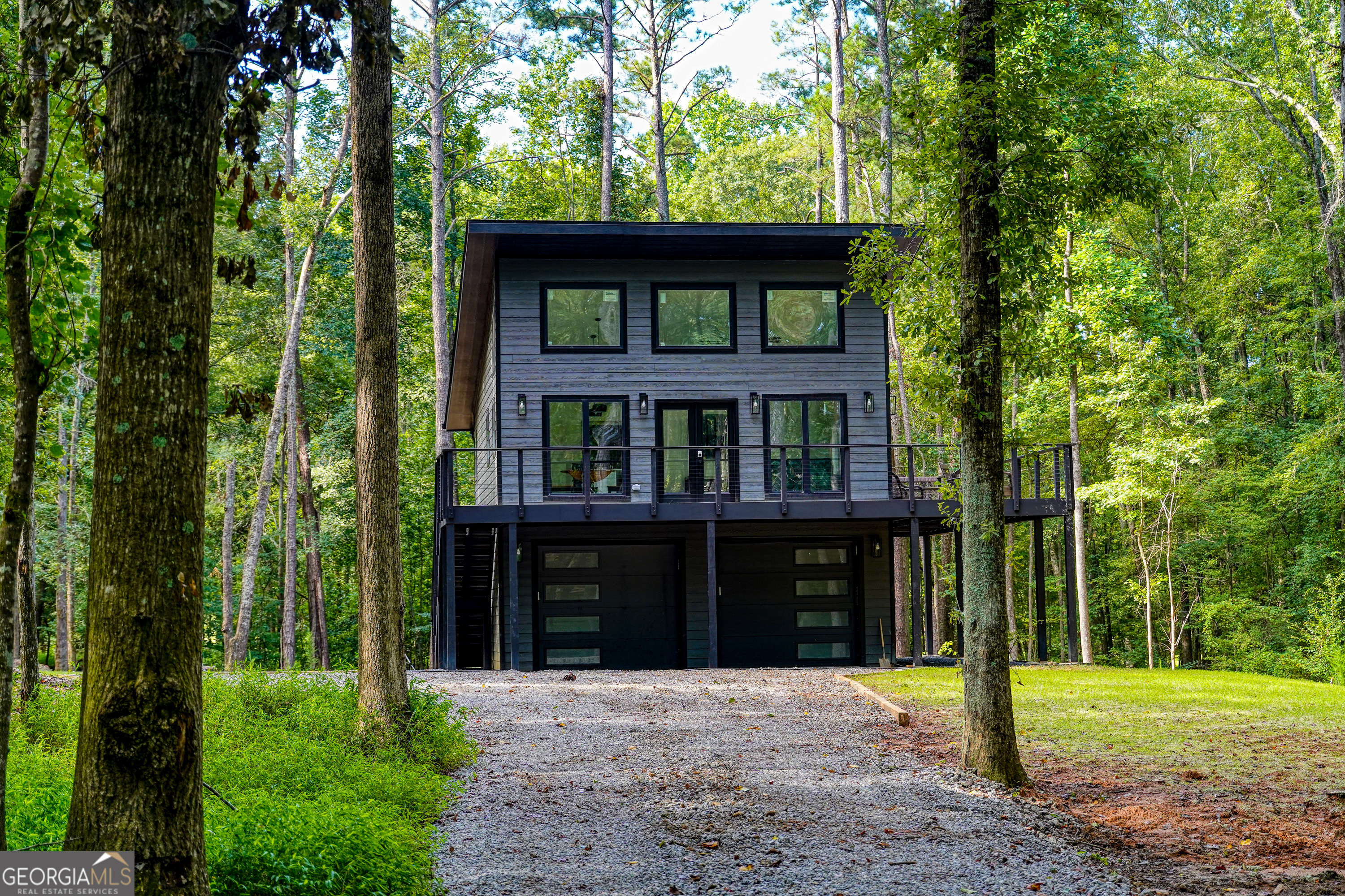 440 Palmetto Road Tyrone, GA 30290 - Photo 31 of 32 a front view of a house with a yard