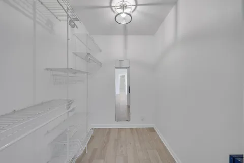 a view of a room with racks on the wall