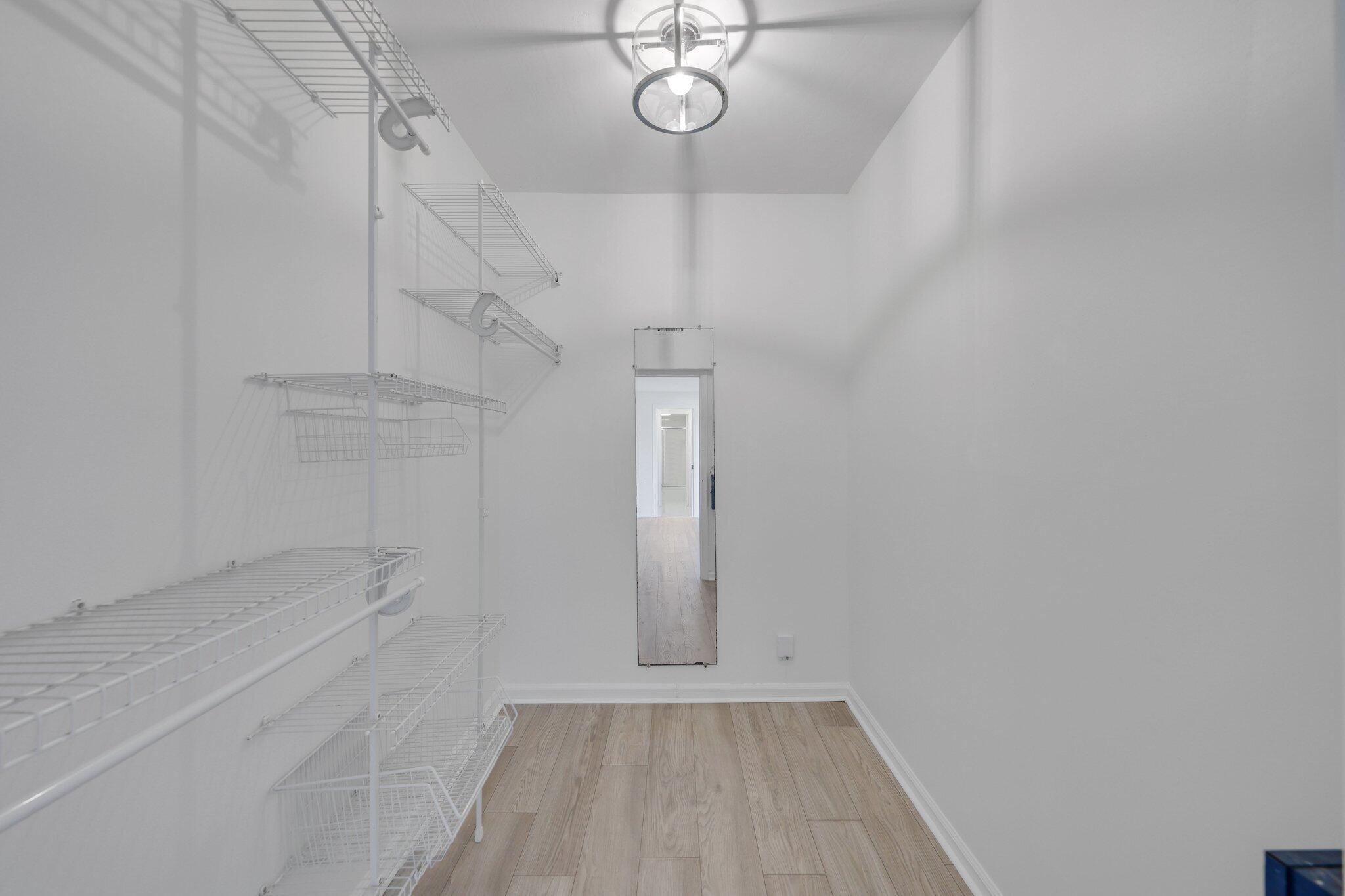 200 Intracoastal Place, Unit 206 Jupiter, FL 33469 - Photo 15 of 35 a view of a room with racks on the wall