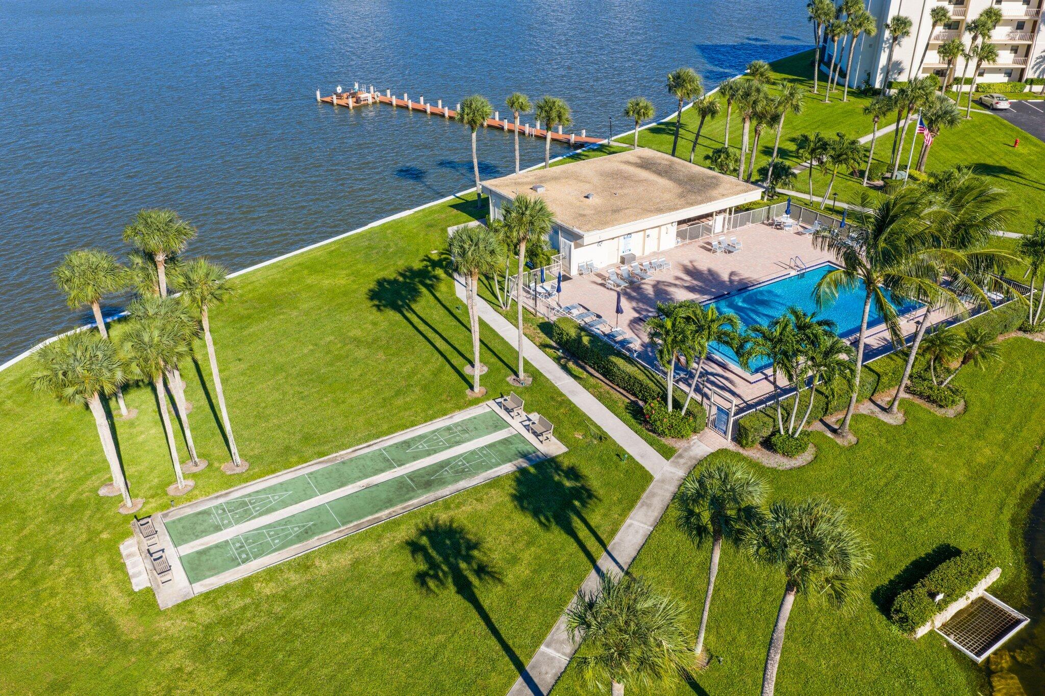 200 Intracoastal Place, Unit 206 Jupiter, FL 33469 - Photo 30 of 35 a view of swimming pool with a yard