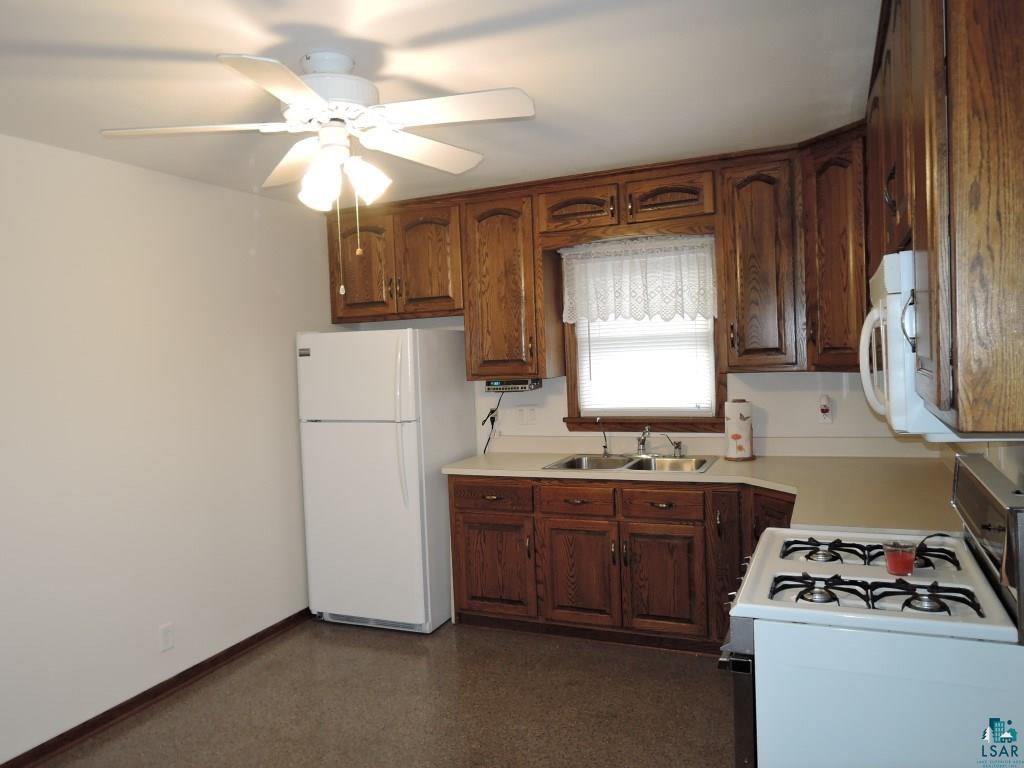 2706 Diane Avenue Racine, WI 53404 - Photo 8 of 34 Custom oak kitchen cabinets