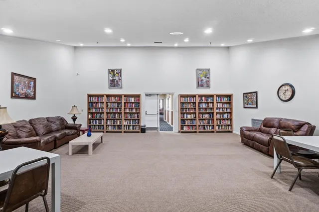 a view of livingroom with furniture and white walls
