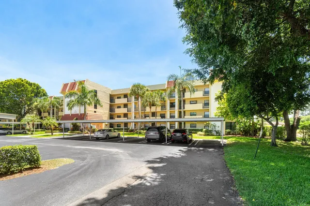 a building with trees in front of it