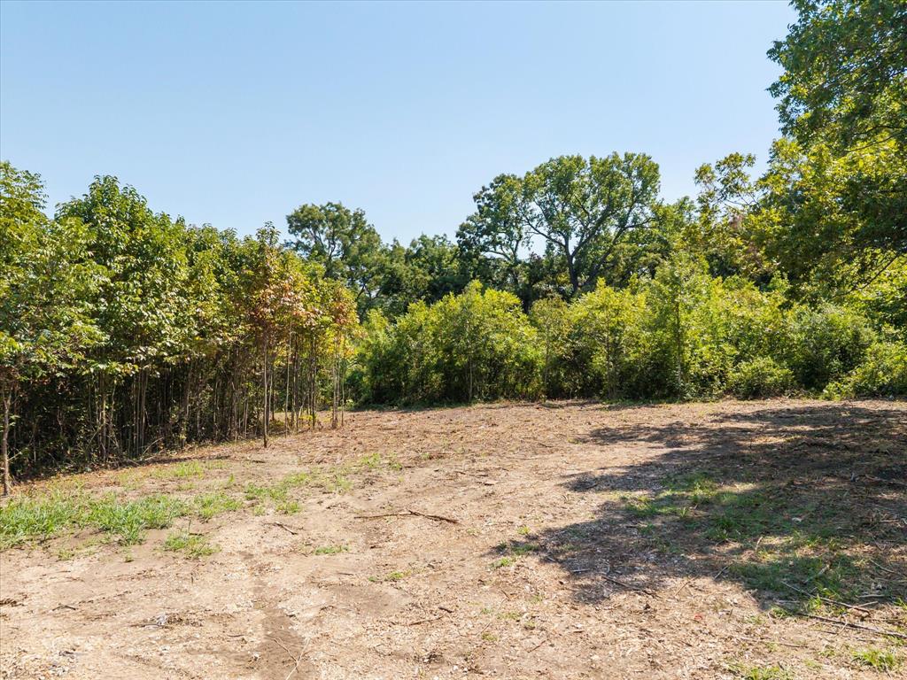 3108 Troy Road Wylie, TX 75098 - Photo 11 of 29 a street view with large trees
