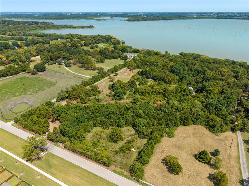 3108 Troy Road Wylie, TX 75098 - Photo 27 of 29 a view of a lake with a mountain in the background