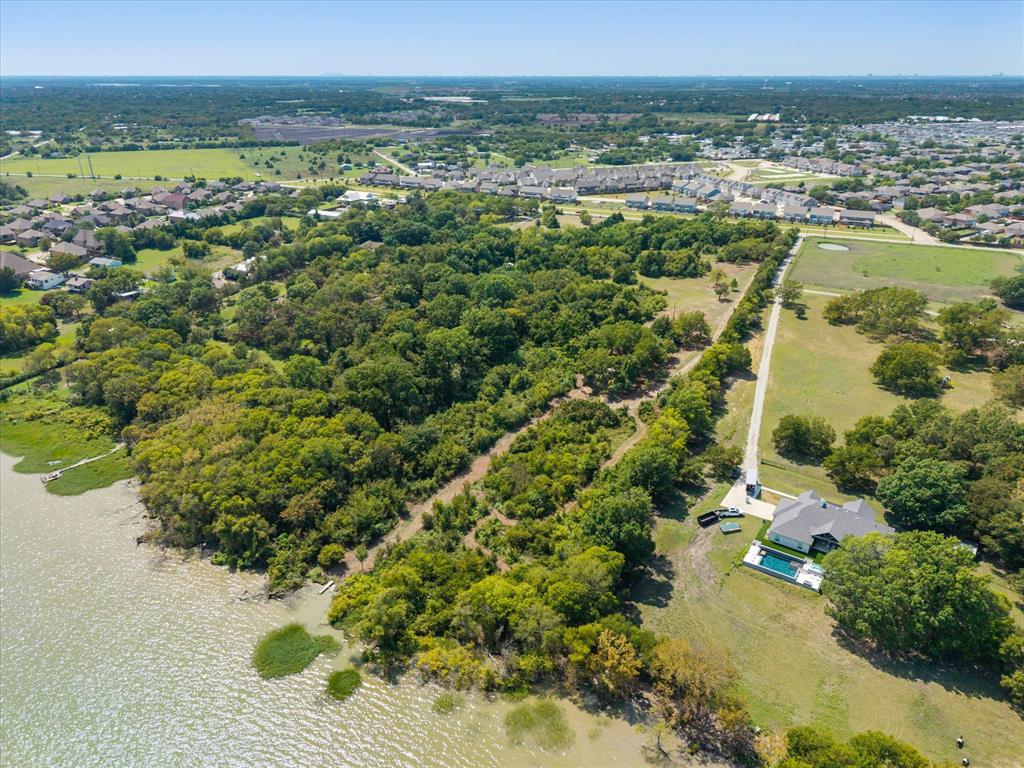 3108 Troy Road Wylie, TX 75098 - Photo 3 of 29 a view of a lake with a city