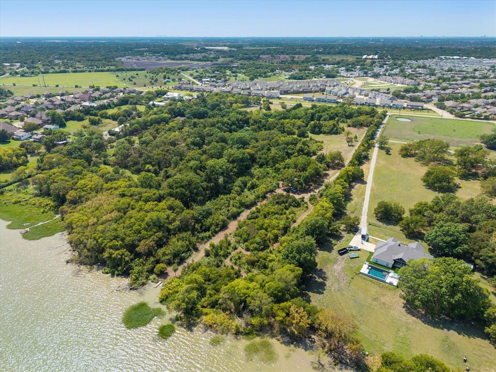 3108 Troy Road Wylie, TX 75098 - Photo 4 of 29 a view of a lake with a city