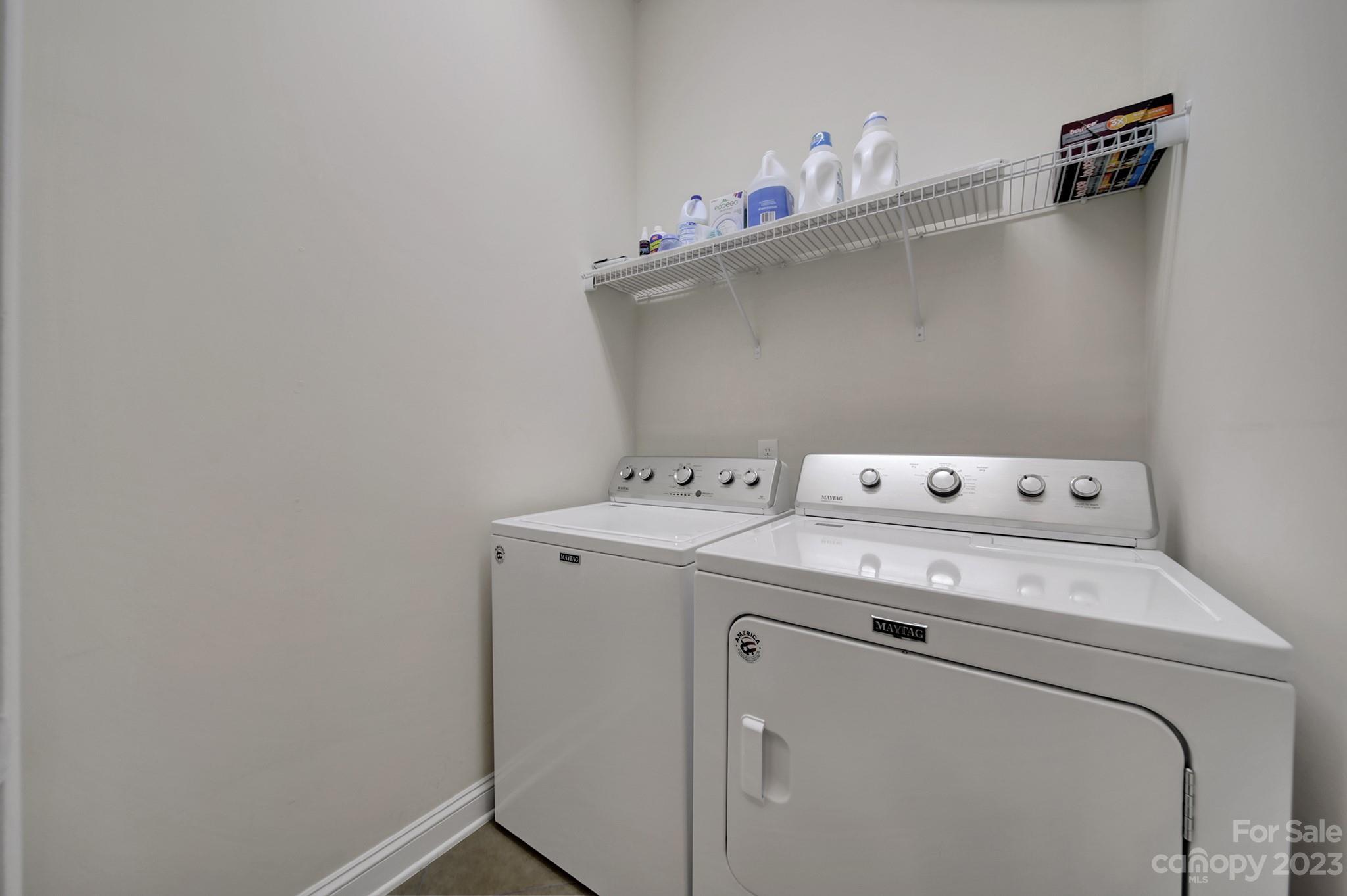 818 Treasure Court Fort Mill, SC 29708 - Photo 20 of 47 a utility room with dryer and washer