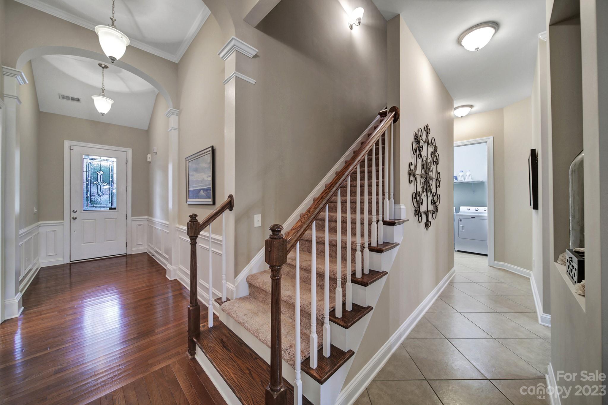 818 Treasure Court Fort Mill, SC 29708 - Photo 2 of 47 a view of entryway and hall with wooden floor