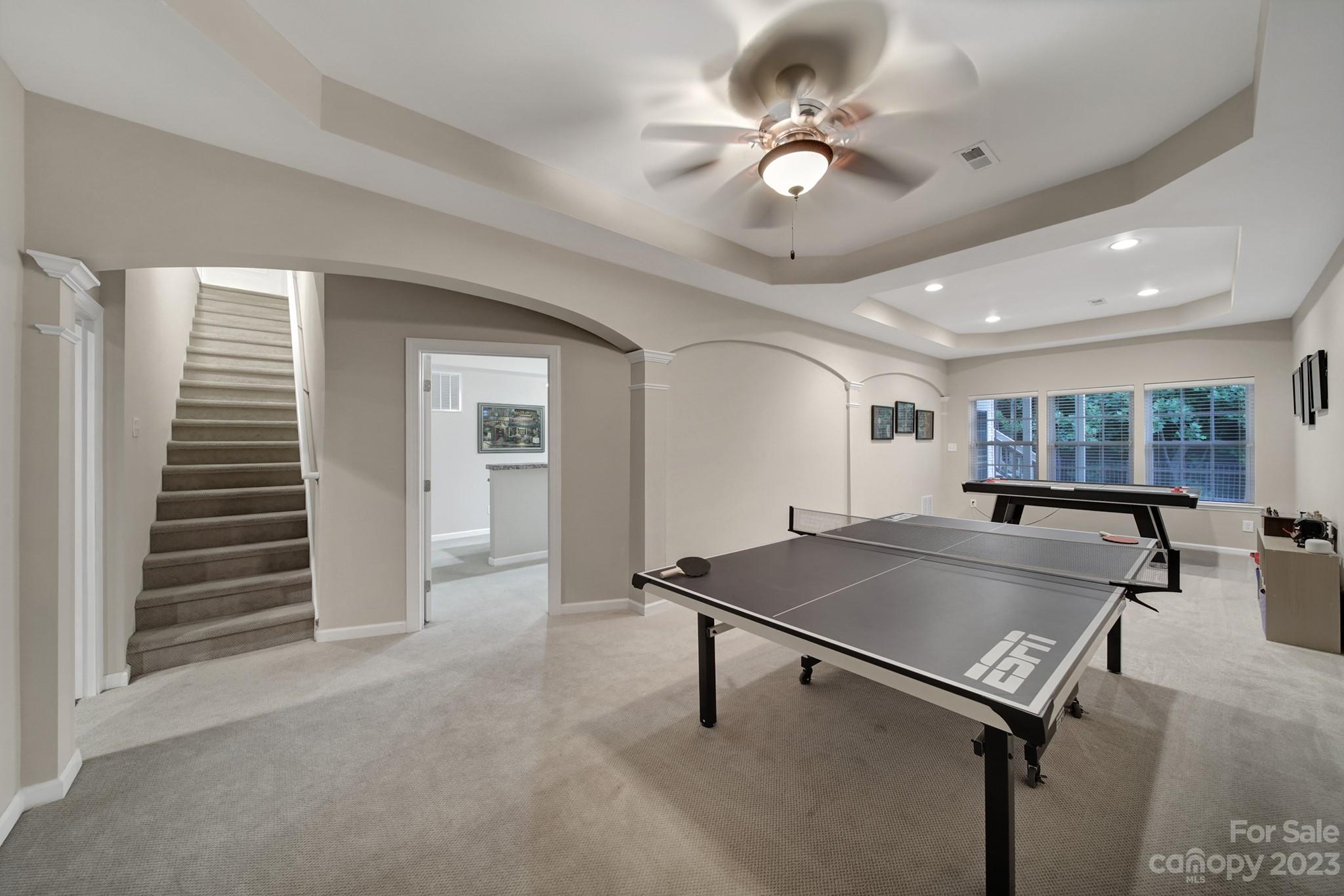 818 Treasure Court Fort Mill, SC 29708 - Photo 22 of 47 a room with pool table and windows