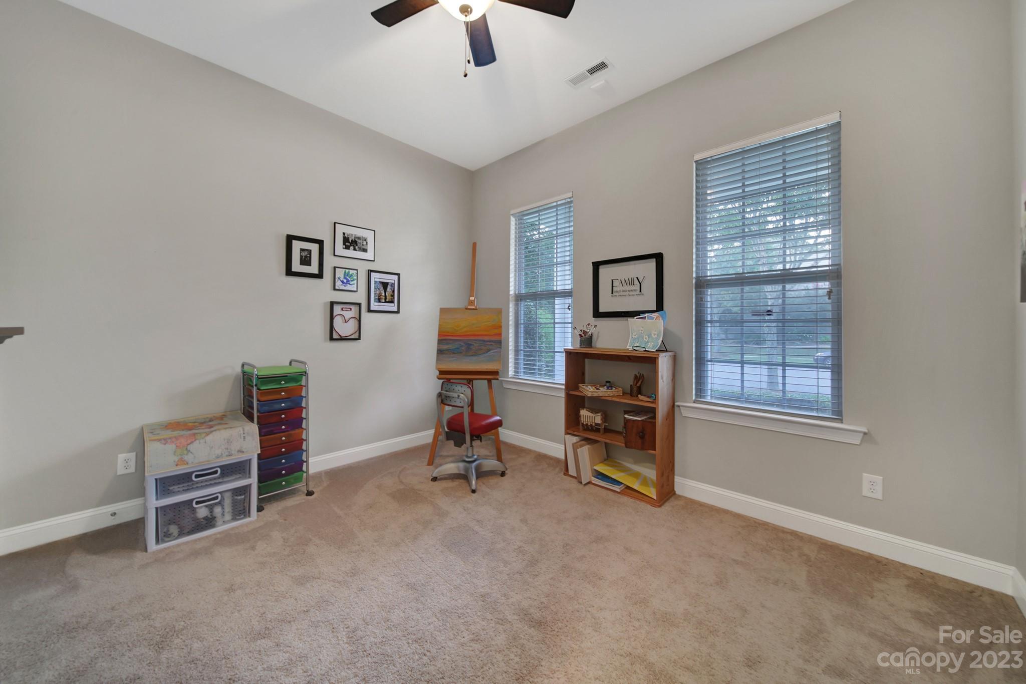 818 Treasure Court Fort Mill, SC 29708 - Photo 31 of 47 a view of a workspace with furniture and windows