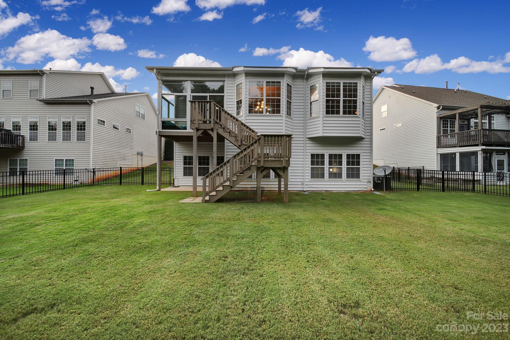 818 Treasure Court Fort Mill, SC 29708 - Photo 37 of 47 a view of a house with a backyard