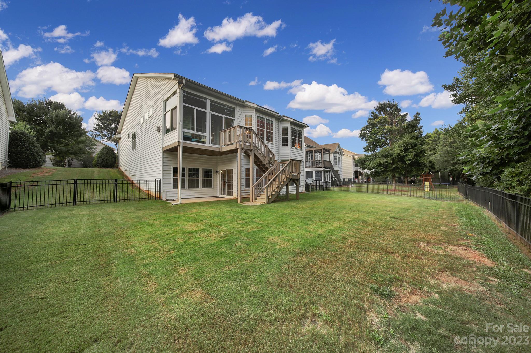 818 Treasure Court Fort Mill, SC 29708 - Photo 38 of 47 a view of a house with a big yard