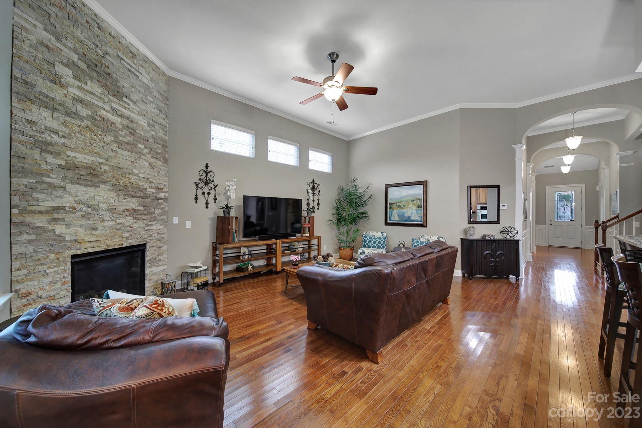 818 Treasure Court Fort Mill, SC 29708 - Photo 4 of 47 a living room with furniture and a fireplace