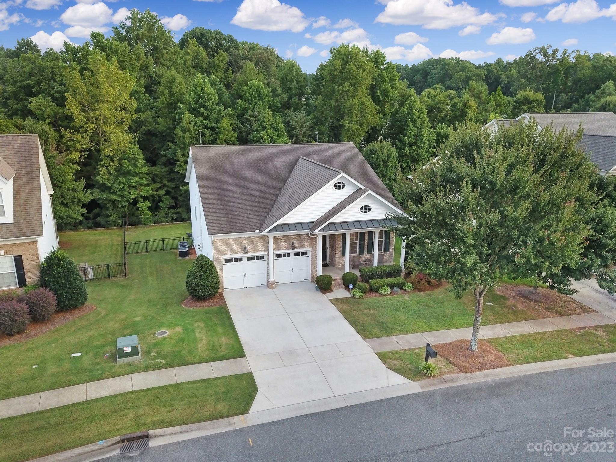 818 Treasure Court Fort Mill, SC 29708 - Photo 45 of 47 a front view of a house with a yard