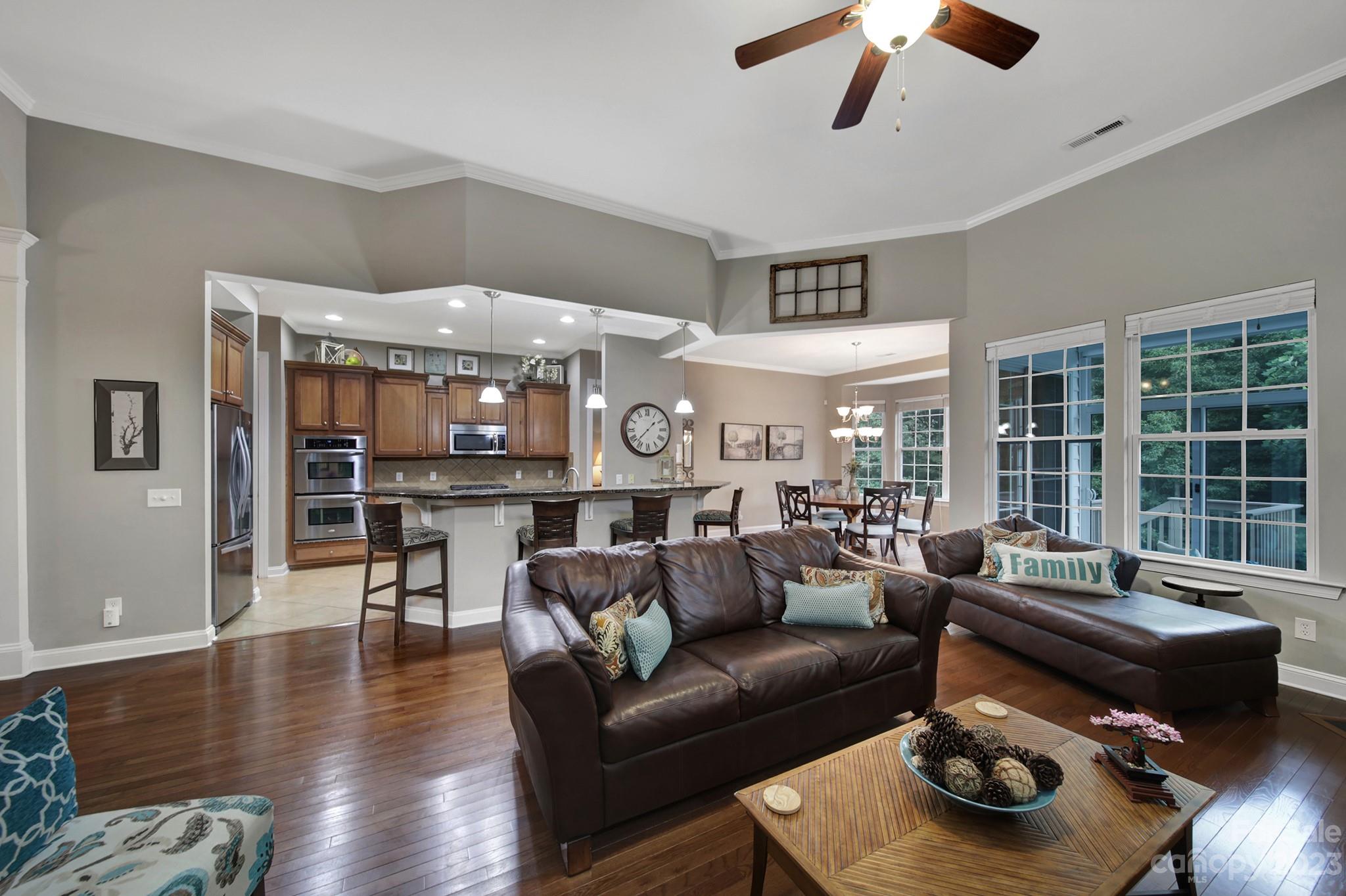 818 Treasure Court Fort Mill, SC 29708 - Photo 5 of 47 a living room with furniture and a large window