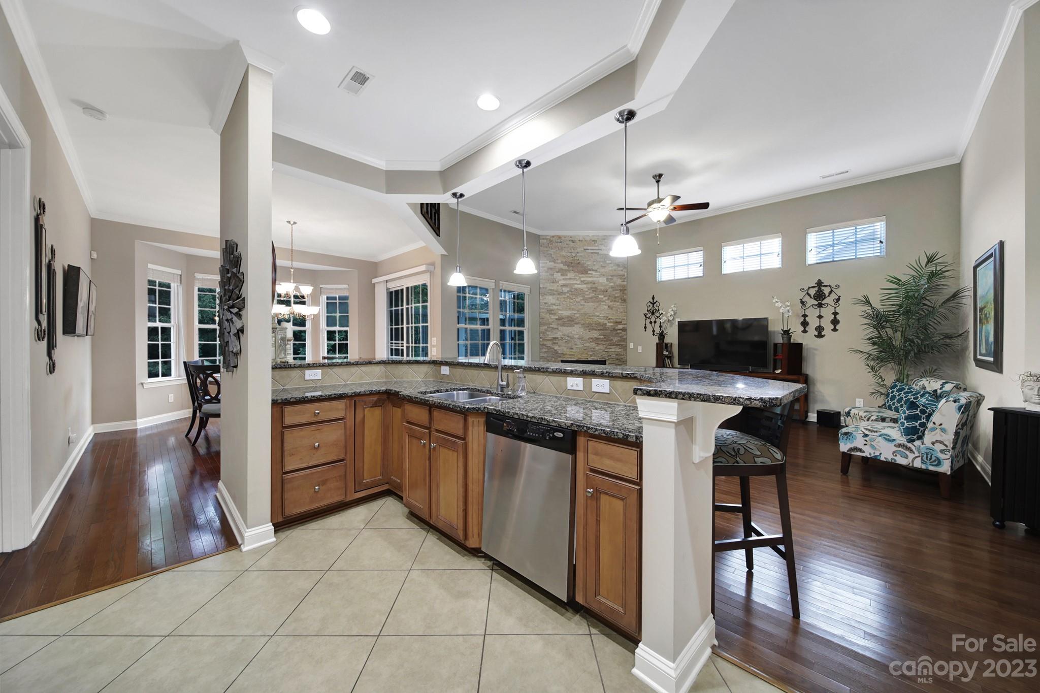 818 Treasure Court Fort Mill, SC 29708 - Photo 8 of 47 a large kitchen with a table and chairs