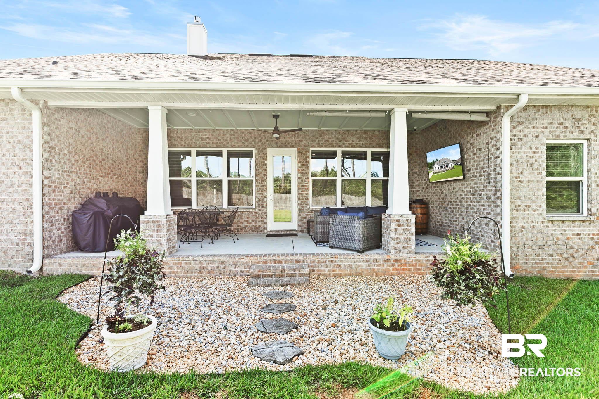 12785 Warbler Street Daphne, AL 36527 - Photo 35 of 53 View of patio / terrace with area for grilling, ceiling fan, and an outdoor living space